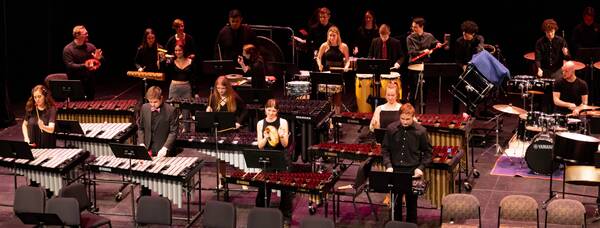 One of the ND Section Ensembles, specifically the Percussion Ensemble, performs on stage at the DeBartolo Performing Arts Center at their annual concert